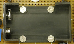 Enclosed 9V battery holder