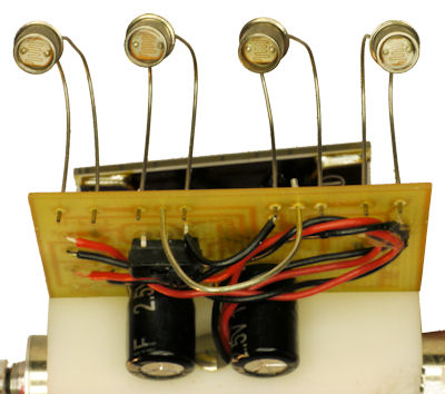 Photosensors front wire slide 1 farad capacitors and light dark line switch